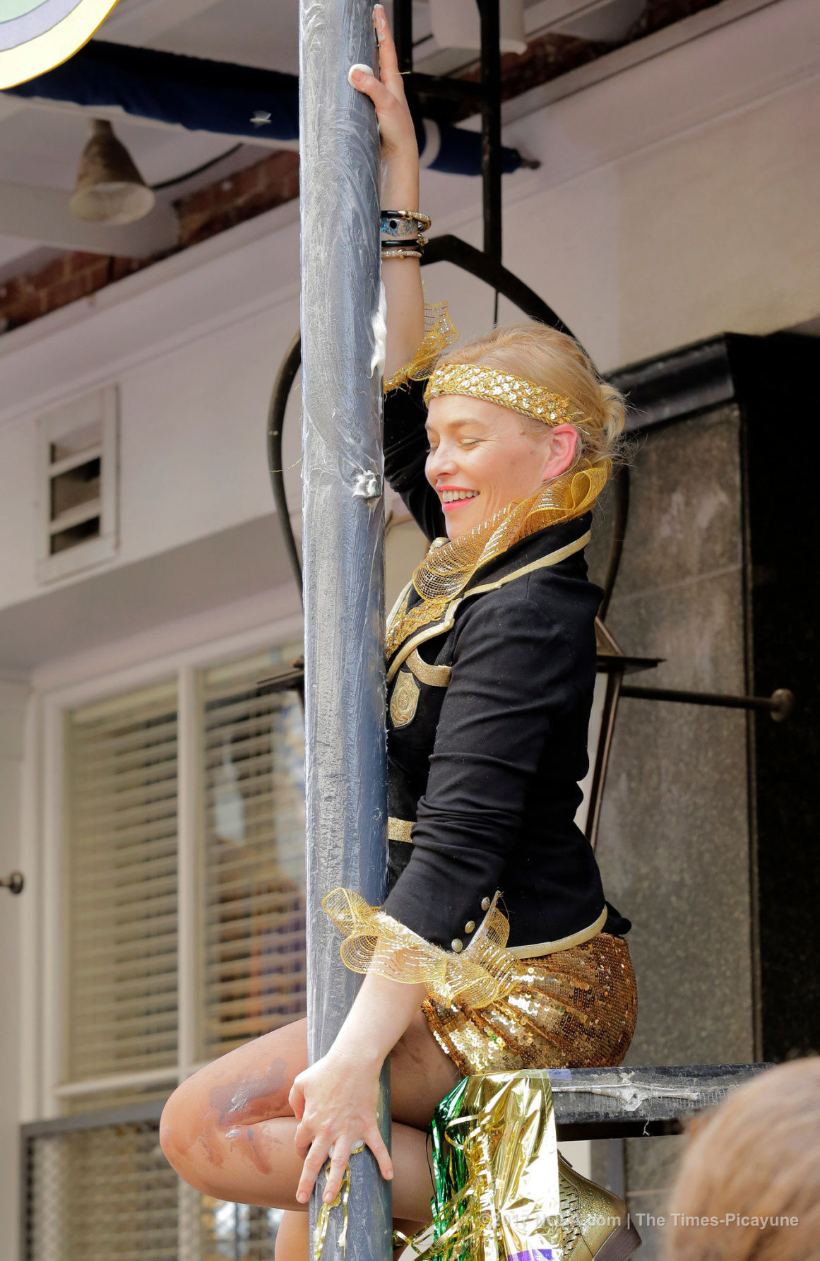 Only on Bourbon Street: Greasing of the Poles for Mardi Gras